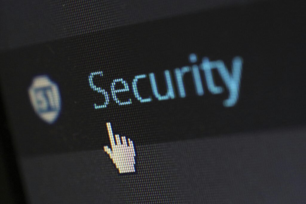 security protection anti virus software 60504 60504 Close-up view of a mouse cursor over digital security text on display.